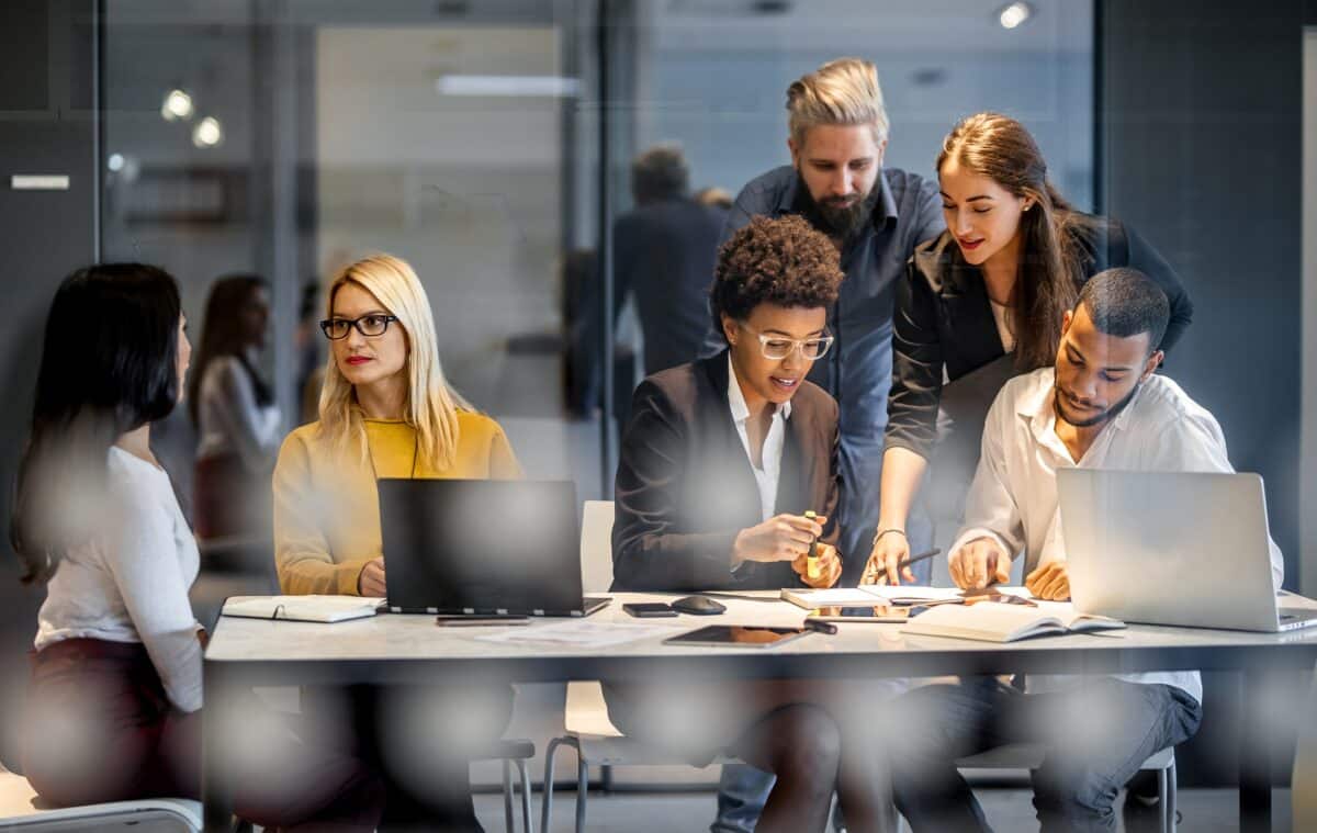 Protect against cyber-attacks. People meeting in the office.