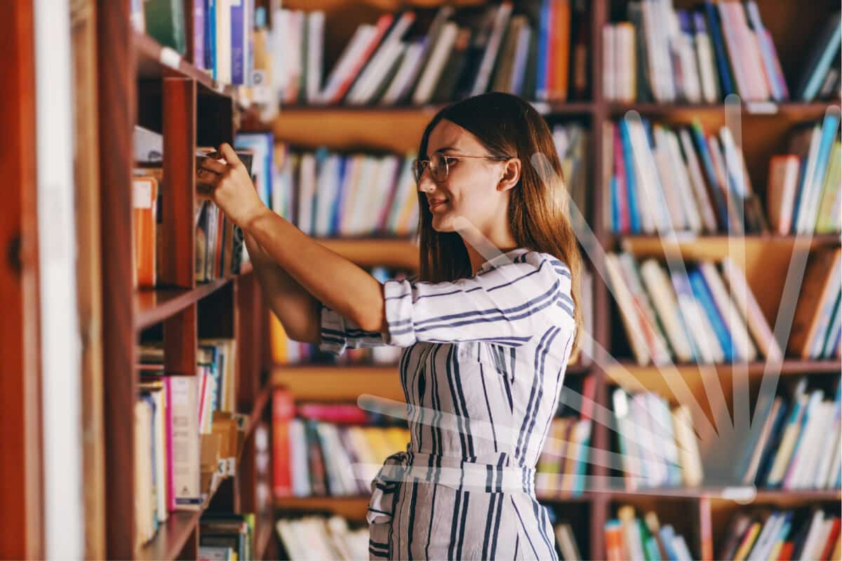 Access Lab 2025. Librarian choosing books.